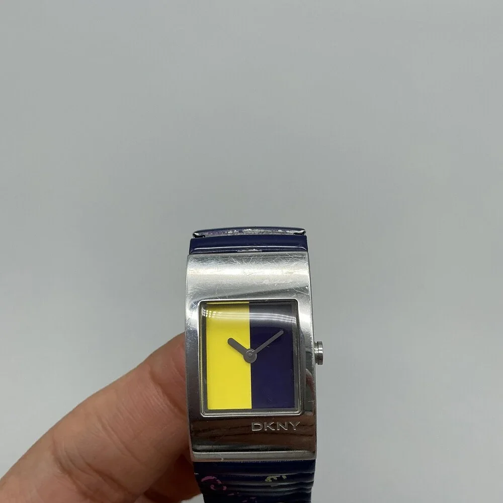 DKNY Womens Watch 19mm Silver Tone Multicolor Dial Blue Stretch Band New Battery